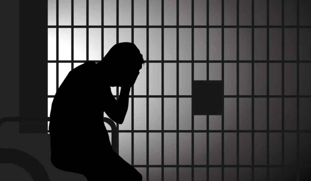 Silhouette-of-man-in-prison